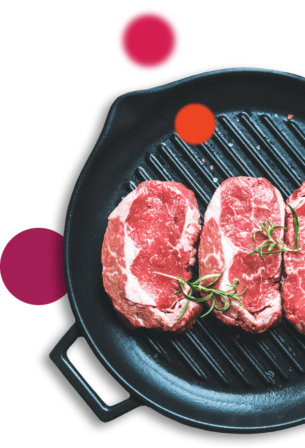 Steak on pan with seasoning
